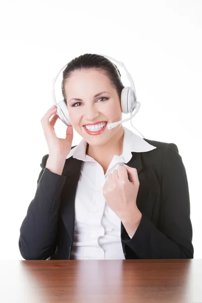 Biznes kobieta ze słuchawkami. — Zdjęcie stockowe