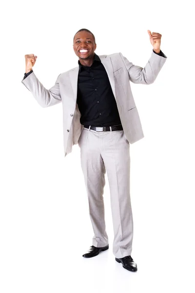 Male businessman with hands up, smiling. — Stock Photo, Image