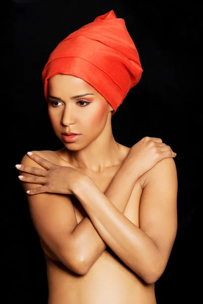 Attractive woman's bust in turban. — Stock Photo, Image