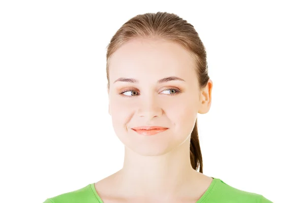 Attractive woman's face, looking into side. — Stock Photo, Image