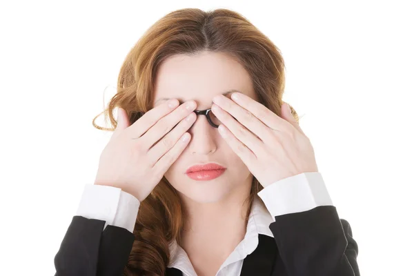 Beautiful business woman covering her eyes. — Stock Photo, Image