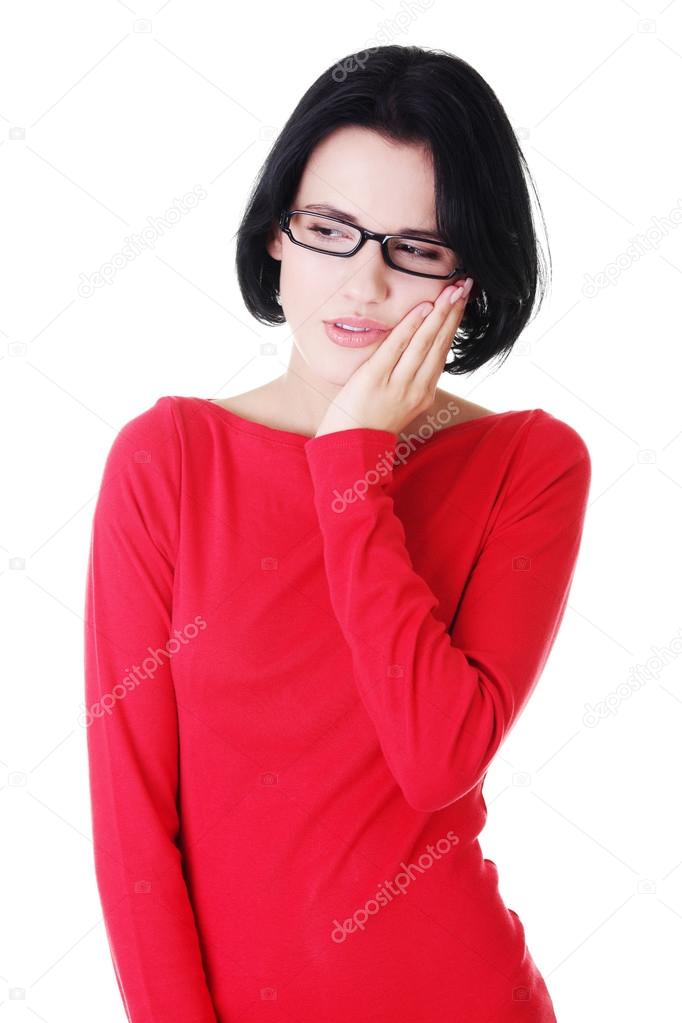 Young attractive woman in eyeglasses worried.
