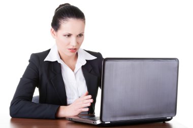 dizüstü bilgisayar ile oturup iş kadını.