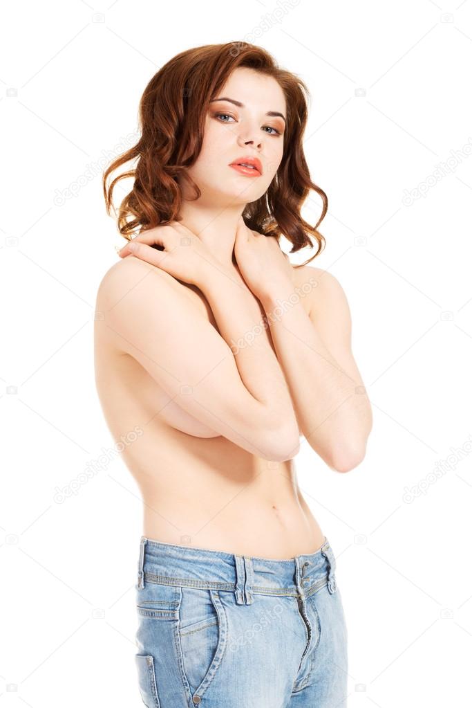 Sexy fit topless woman in blue jeans.