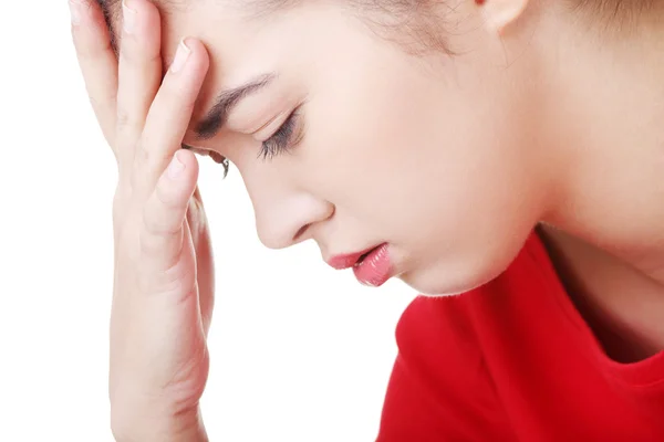 Csual woman holding her head. — Stock Photo, Image