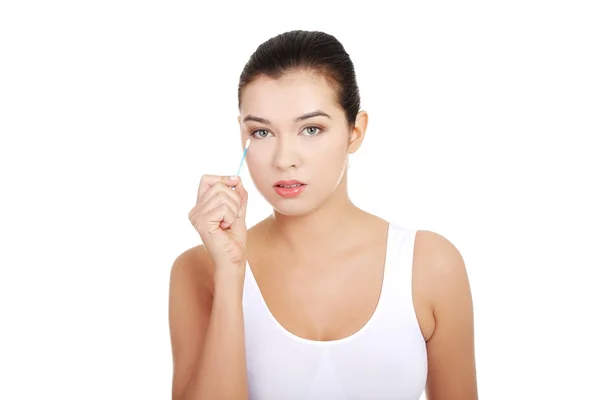 Attractive woman with cotton stick. — Stock Photo, Image