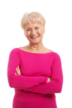 pembe rahat kıyafetler içinde bir yaşlı kadının portresi.