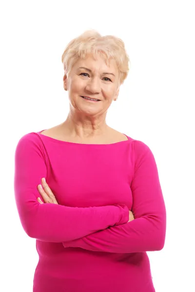 Retrato de uma senhora idosa em roupas casuais rosa . — Fotografia de Stock