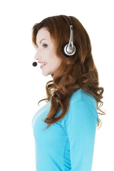 Mulher casual atraente com fones de ouvido e microfone . — Fotografia de Stock