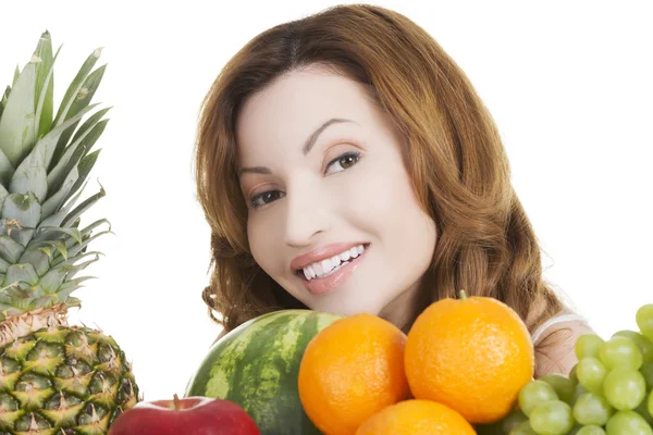 Happy casual woman with fruits. — Stock Photo, Image