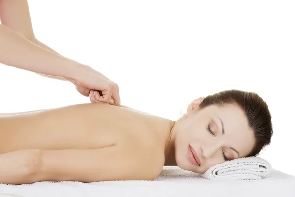 Preaty woman relaxing being massaged in spa saloon. — Stock Photo, Image