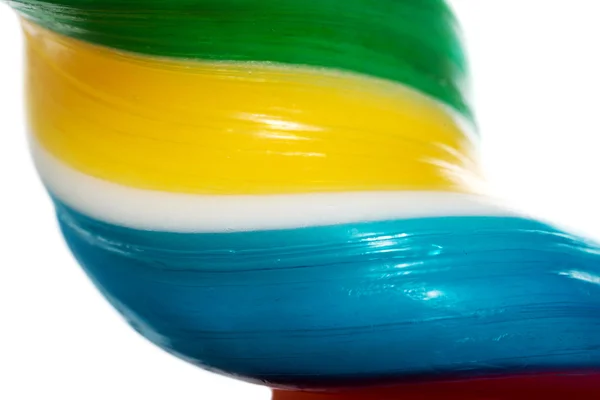 Close up on longitudinal and colorful lollipop. — Stock Photo, Image