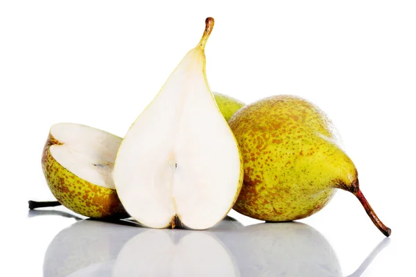 Fresh greeny pears divided into two over white. — Stock Photo, Image