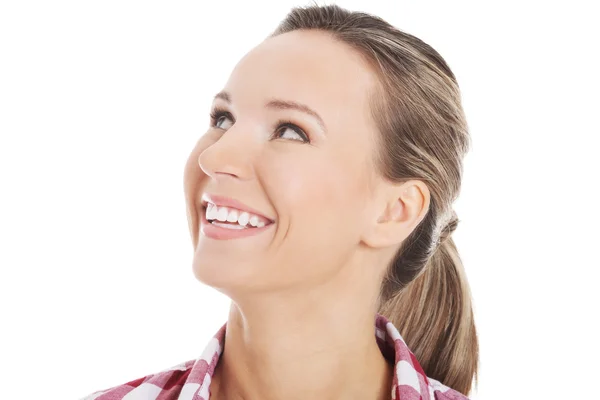 Portrait of a young woman looking up. — Stock Photo, Image