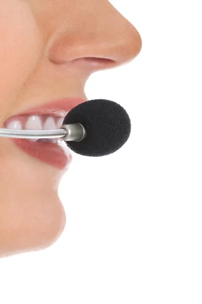 Close up on female's mouth with microphone. — Stock Photo, Image