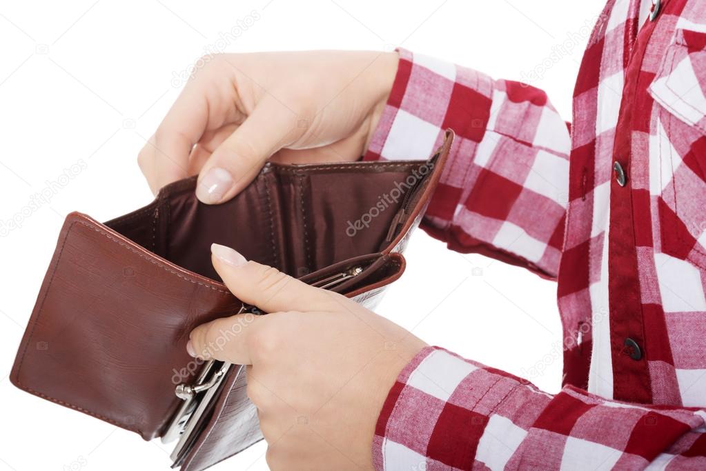 Casual woman showing her empty wallet.