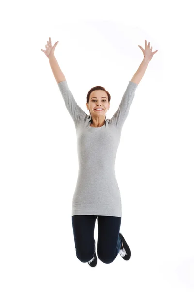 Casual woman jumping. — Stock Photo, Image