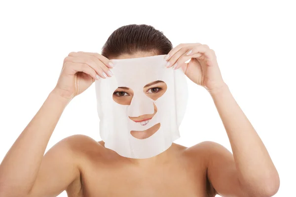 Beautiful woman with collagen mask. — Stock Photo, Image