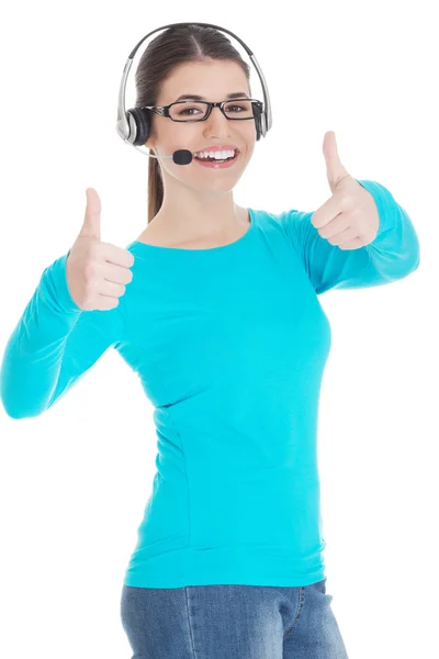 Young casual woman with headphones and microphone showing ok. — Stock Photo, Image