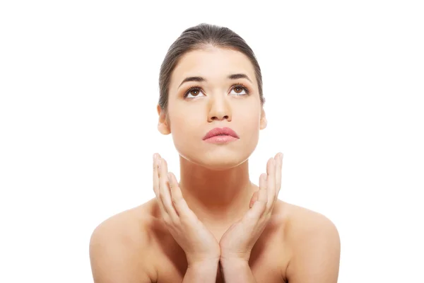 Portrait of beautiful woman with her hands under face. — Stock Photo, Image