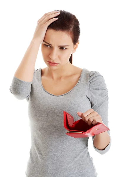 Beautiful casual woman with empty wallet, worrying. — Stock Photo, Image