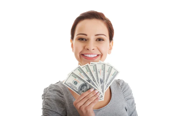 Beatiful casual woman holding money. — Stock Photo, Image