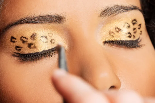 Close up on beautiful tiger make-up. — Stock Photo, Image