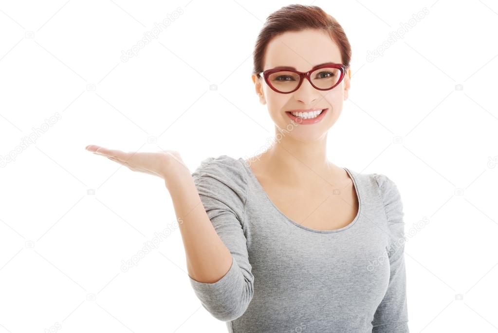 Beautiful casual woman with empty copy space on hands.