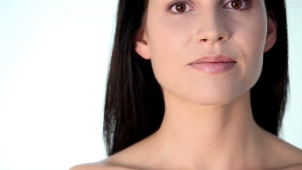 Beautiful young woman. Over white background. — Stock Video