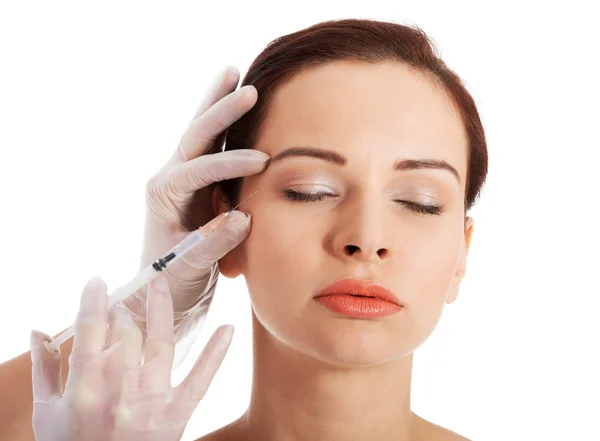 Beautiful woman's face is prepared to medical surgery. Royalty Free Stock Images