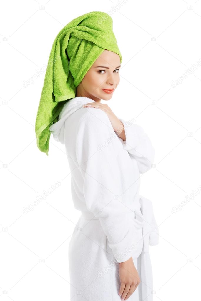 Beautiful spa woman in bathrobe and turban.