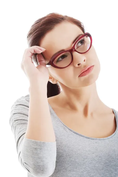 Portrait of thoughtful woman in eyeglasses. — Stock Photo, Image