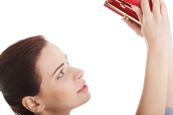 Beautiful casual woman showing her empty wallet. — Stock Photo, Image