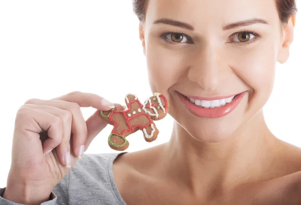 Beautiful casual woman with gingerbread christmas cookies. — Stock Photo, Image