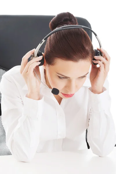 Cansada, mulher de negócios triste no call center . — Fotografia de Stock