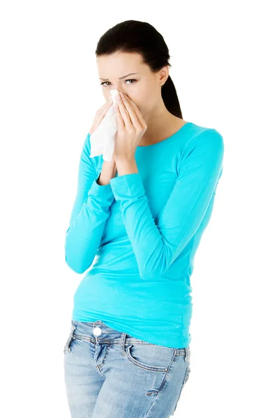 Young casual woman with tissue. — Stock Photo, Image