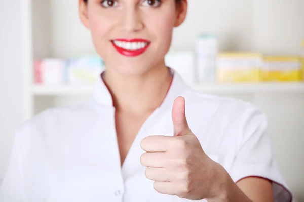 Young nurse, doctor showing ok gesture. — Stock Photo, Image