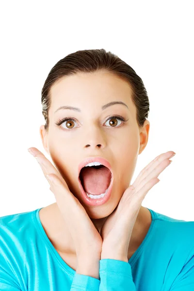 Beautiful casual woman expresses shock. Stock Picture
