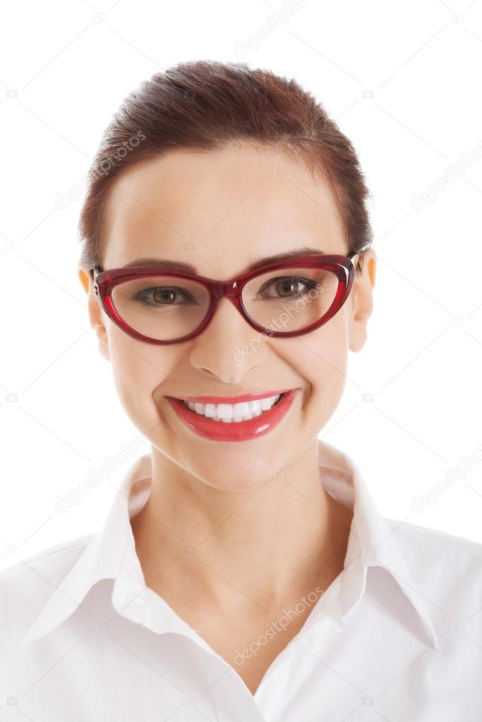 Portrait of beautiful business woman in red eyeglasses.