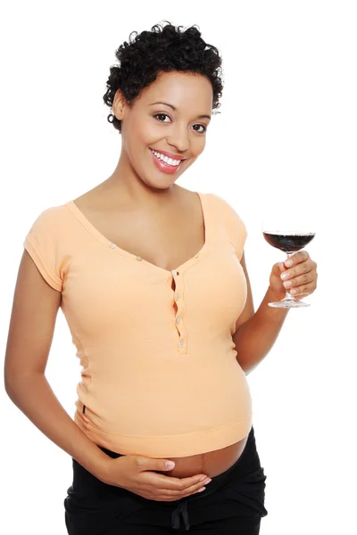 Terhes nő üzem üveg bor — Stock Fotó