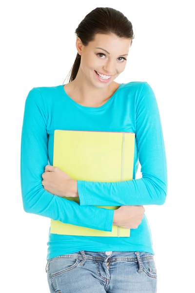 Heureuse étudiante femme avec des cahiers — Photo