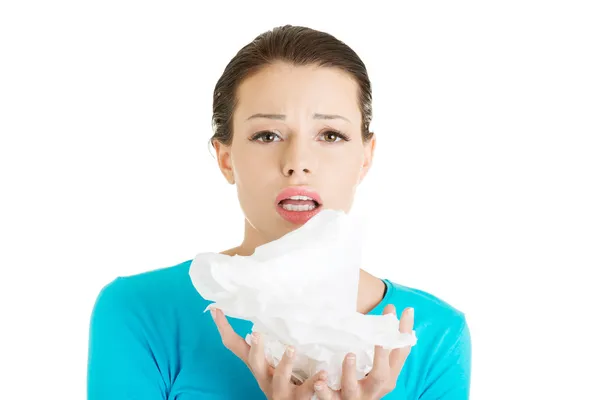 Young woman with tissue - sneezing — Stock Photo, Image