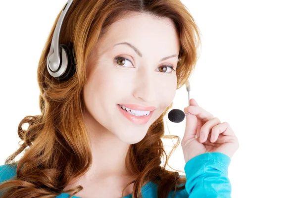 Mulher adulta atraente com fones de ouvido — Fotografia de Stock
