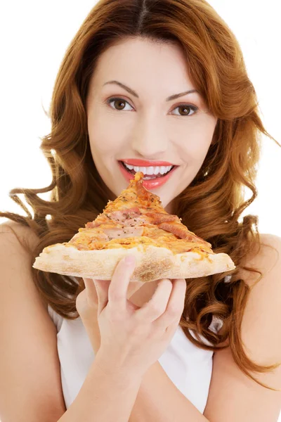 Gelukkige vrouw eten van pizza. — Stockfoto