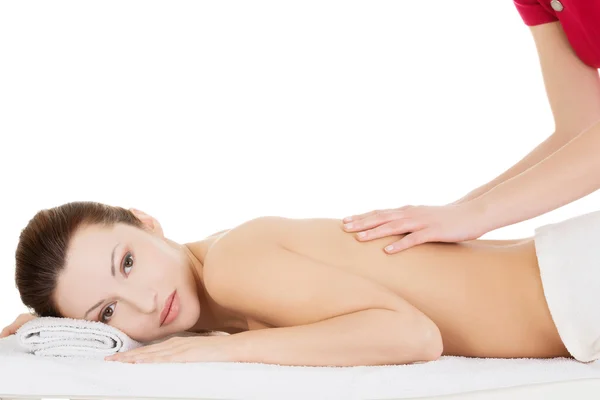 Preaty woman relaxing beeing massaged in spa — Stock Photo, Image
