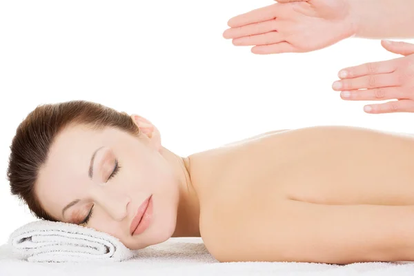 Preaty woman relaxing beeing massaged in spa — Stock Photo, Image