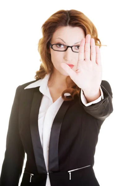 Serious business woman gesturing stop sign — Stock Photo, Image