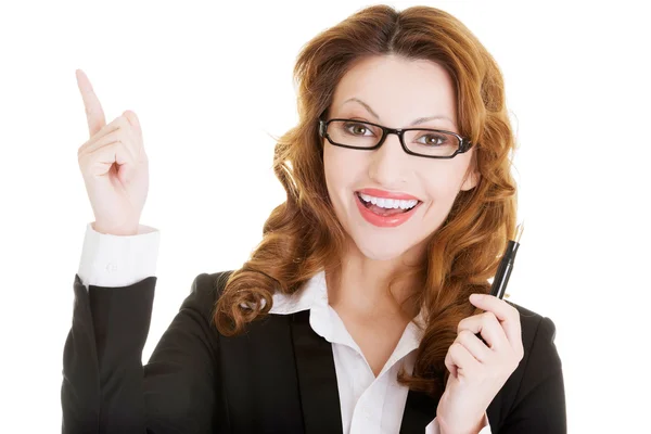 Happy business woman showing copy space — Stock Photo, Image