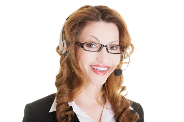 Beautiful call-center assistant smiling — Stock Photo, Image