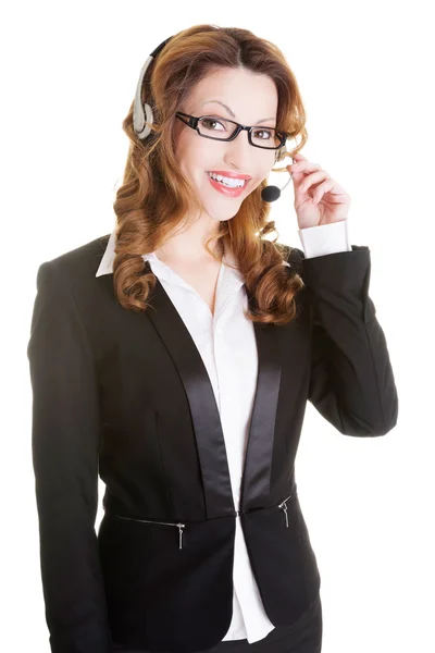 Schöne Callcenter-Assistentin lächelt — Stockfoto